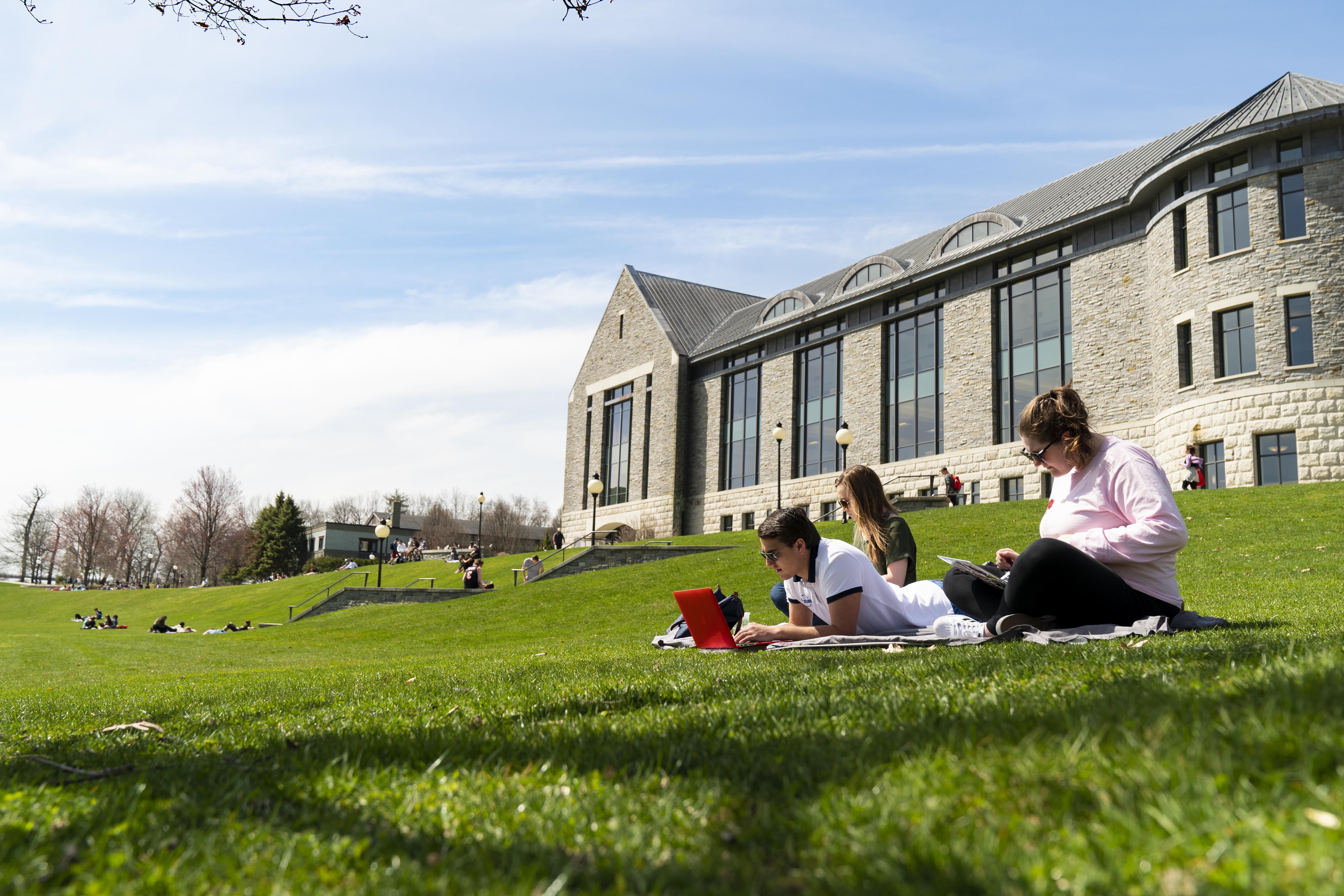 Photo of students outside library